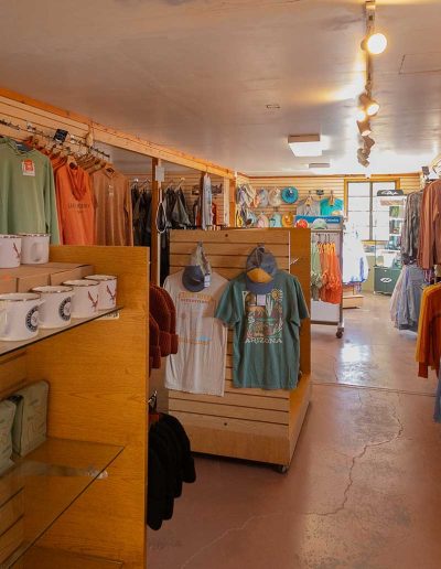 cliffdwellers general store banner Gift shop with mugs, shirts, and books for sale.